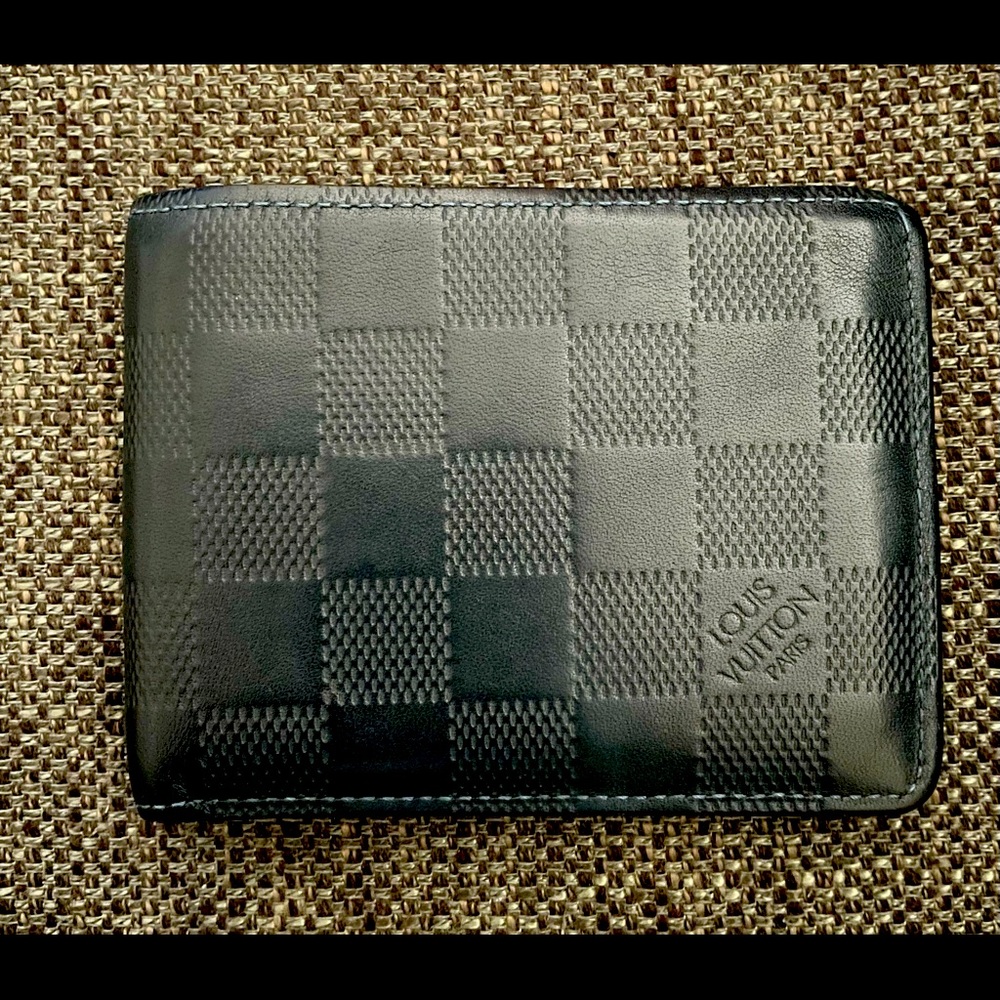 Authentic Louis Vuitton men’s graphite damier bi-fold
